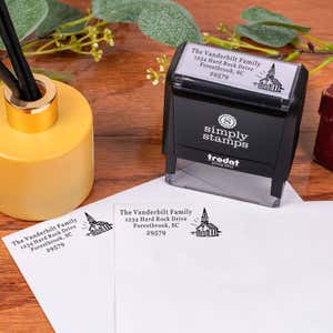 Church Building Rectangle Address Stamp design impression on two envelopes next to self inking stamp body