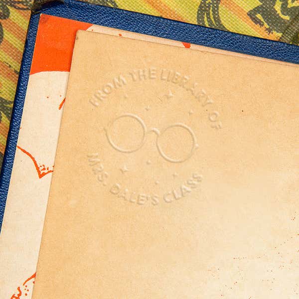 Example of the book embosser impression on brown paper in a book