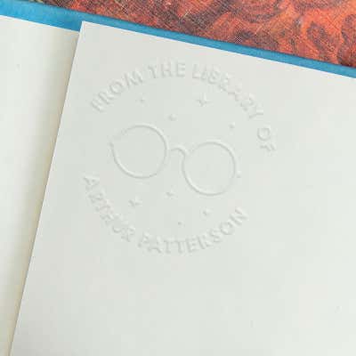 Example of the personalized book embosser impression on a book