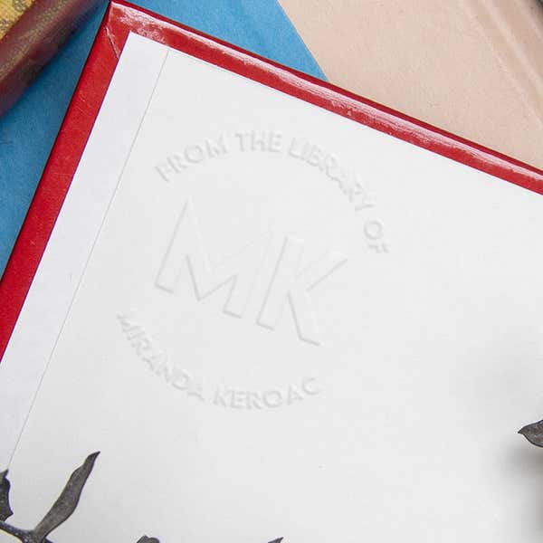 Example of the Modern Initial Round Book Embosser impression in a book