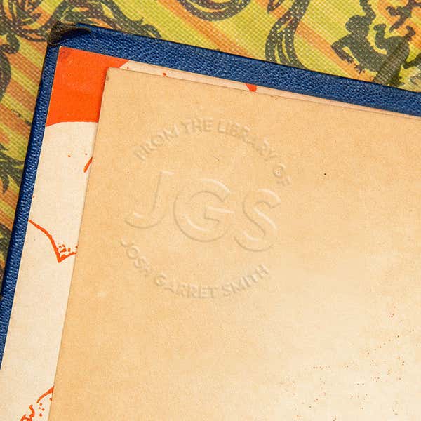 Example of the Modern Initial Round Personalized Book Embosserimpression on the inside pages of a book
