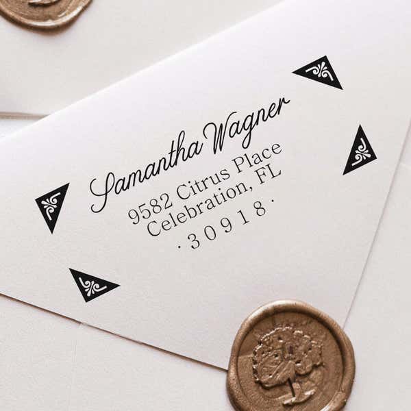 Wagner Fancy Border Address Stamp impression close up on white envelope