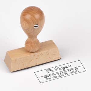 Villages Address Stamp impression next to european stamp body