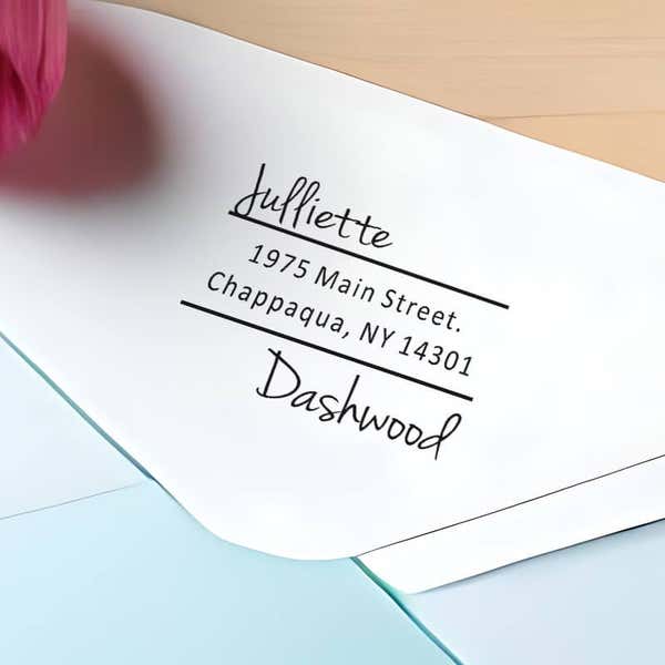 Davenport Offset Address Stamp impression closeup on light blue envelope