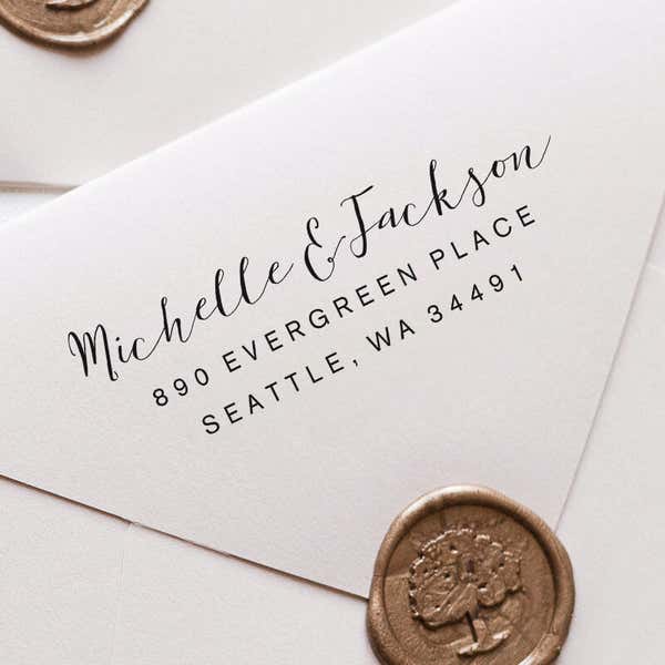 Fully Customizable Script Name Return Address Stamp impression close up on white envelope