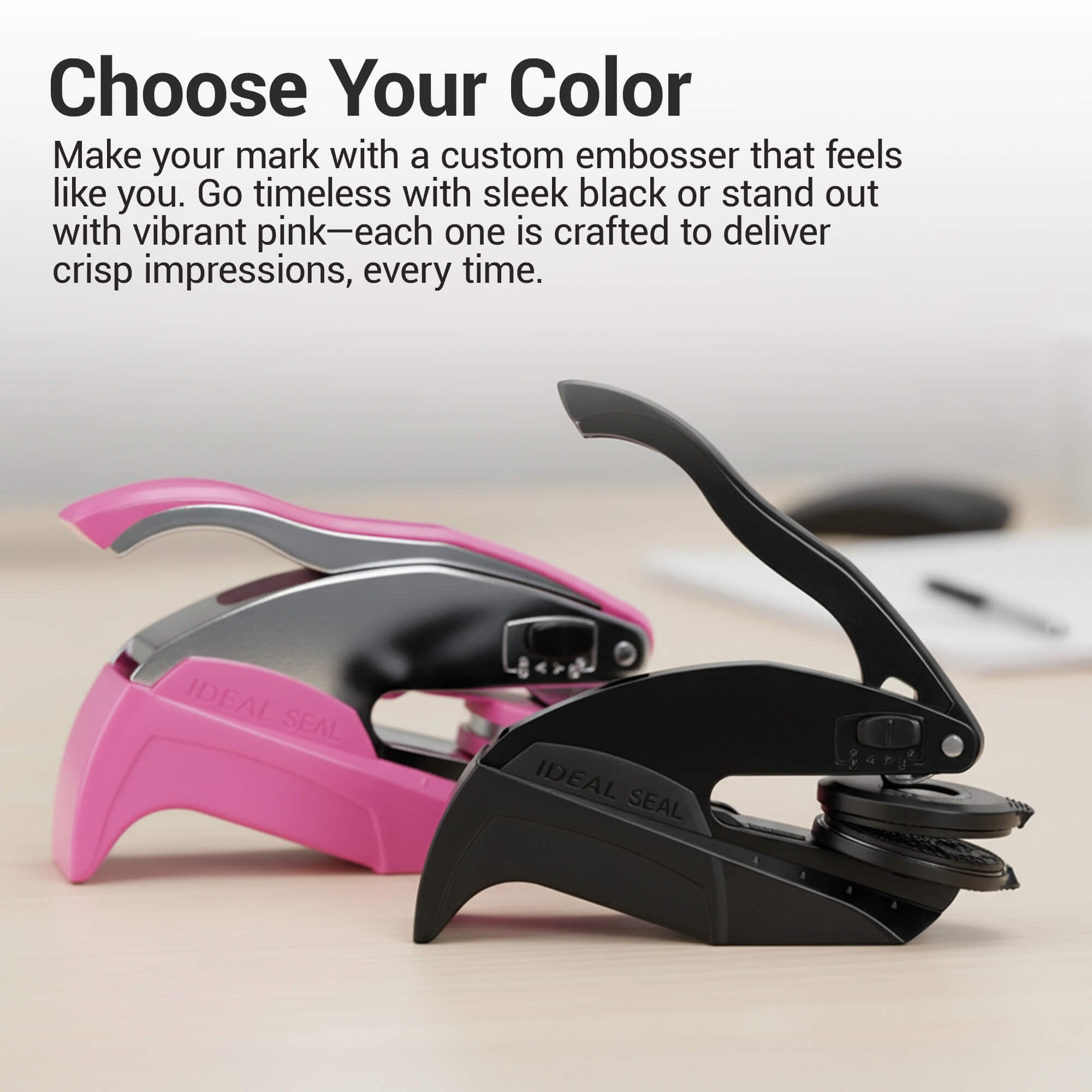 Pink and Black embosser options on a desk 