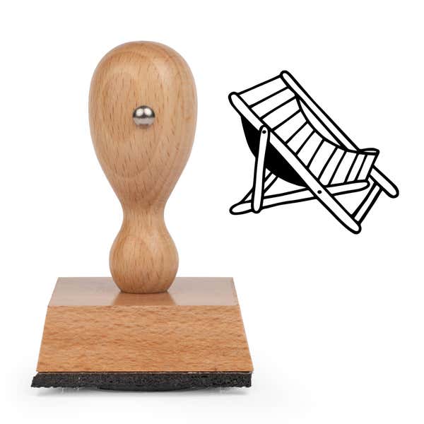 Beach Chair Craft Stamp standing upright beside its black stamped beach chair image