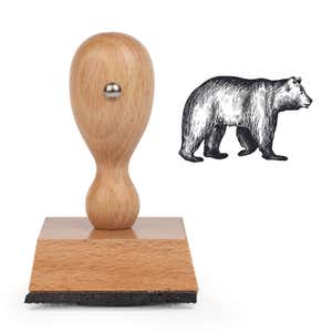Woodland Bear Craft Stamp standing upright beside its black stamped realistic bear image
