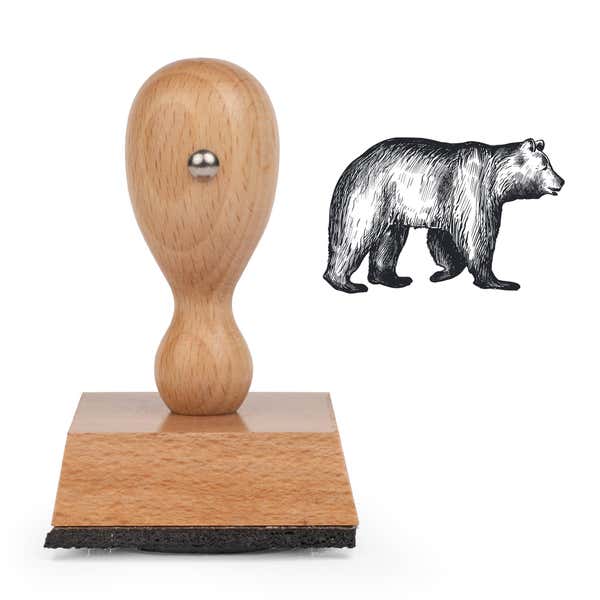 Woodland Bear Craft Stamp standing upright beside its black stamped realistic bear image