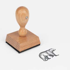 Woodland Bear Craft Stamp at an angle with its wooden handle and block
