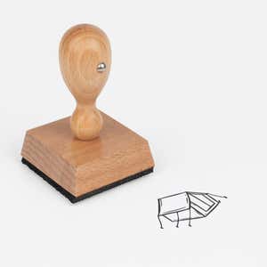 Camp Tent Craft Stamp at an angle with its wooden handle and block