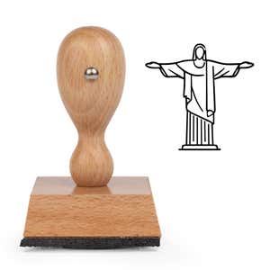 Christ the Redeemer Craft Stamp standing upright beside its black stamped Christ the Redeemer image