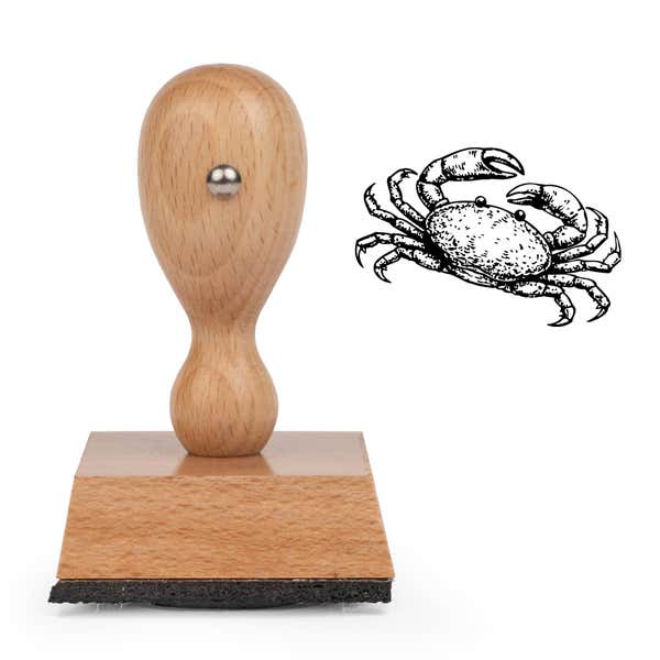 Ocean Crab Craft Stamp standing upright beside its black stamped stippled crab image