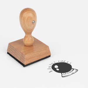 Mystic Crystal Ball Craft Stamp at an angle with its wooden handle and block