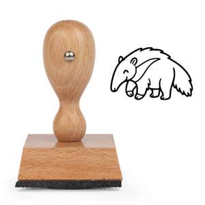Cute Anteater Craft Stamp standing upright beside its black stamped cartoon anteater image