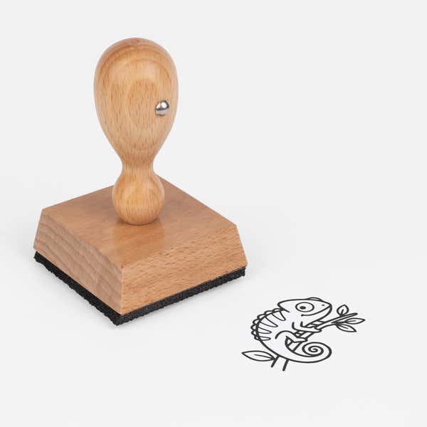 Cute Chameleon Craft Stamp at an angle with its wooden handle and block