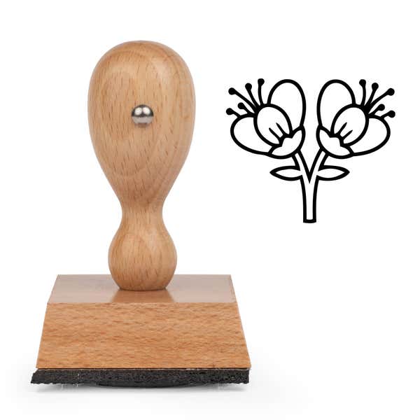 Twin Blossom Branch Craft Stamp standing upright beside its black stamped twin blossom branch image