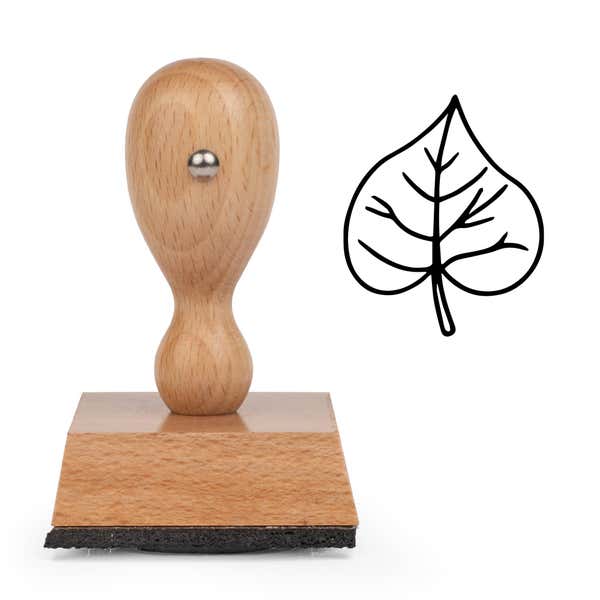 Veined Heart Leaf Craft Stamp standing upright beside its black stamped veined heart leaf image