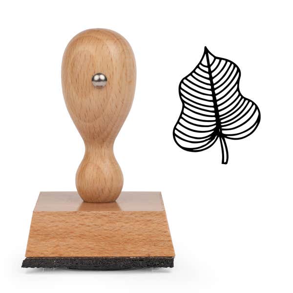 Striped Vein Leaf Craft Stamp standing upright beside its black stamped striped vein leaf image