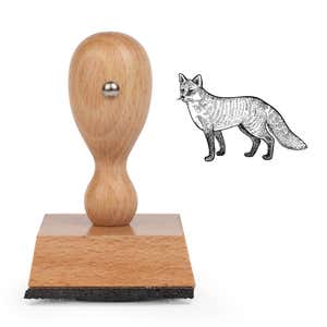 Woodland Fox Craft Stamp standing upright beside its black stamped engraved fox image