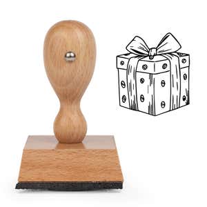 Wrapped Gift Box Craft Stamp standing upright beside its black stamped wrapped gift box image