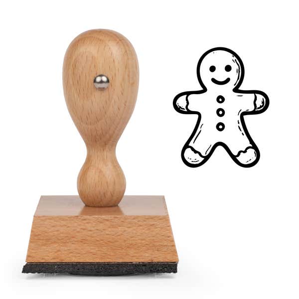 Classic Gingerbread Craft Stamp standing upright beside its black stamped classic gingerbread image