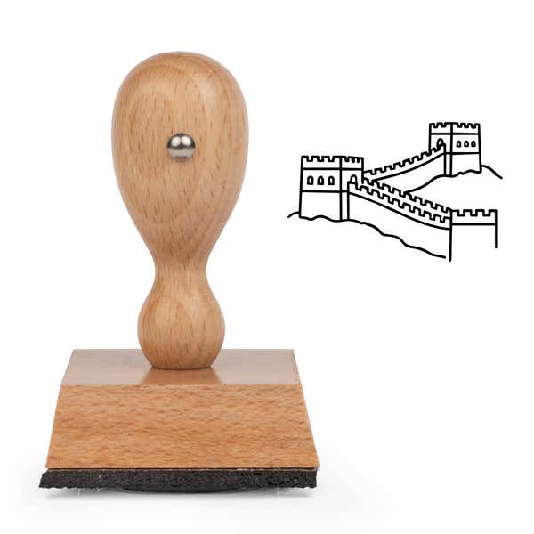 Great Wall of China Craft Stamp standing upright beside its black stamped Great Wall of China image