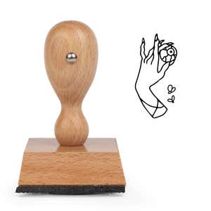 Eerie Hand Eye Craft Stamp standing upright beside its black stamped hand and eyeball image