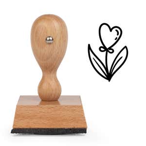 Romantic Heart Flower Craft Stamp standing upright beside its black stamped heart flower image