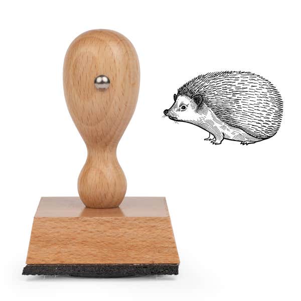 Woodland Hedgehog Craft Stamp standing upright beside its black stamped realistic hedgehog image