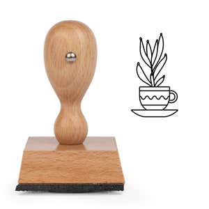 Teacup Houseplant Craft Stamp standing upright beside its black stamped teacup houseplant image