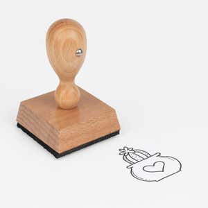 Heart Pot Cactus Craft Stamp at an angle with its wooden handle and block