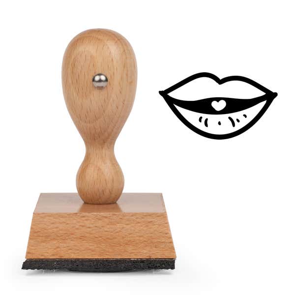Puckered Kissing Lips Craft Stamp standing upright beside its black stamped lips image