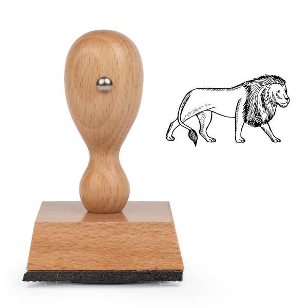 Safari Lion Craft Stamp standing upright beside its black stamped sketched lion image