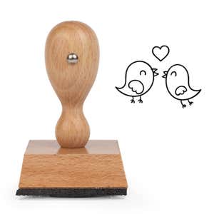Chirpy Love Birds Craft Stamp standing upright beside its black stamped love birds image