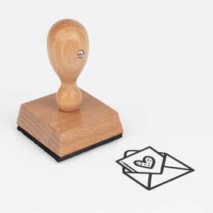 Heartfelt Love Letter Craft Stamp at an angle with its wooden handle and block