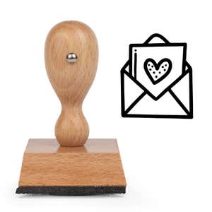 Heartfelt Love Letter Craft Stamp standing upright beside its black stamped love letter image