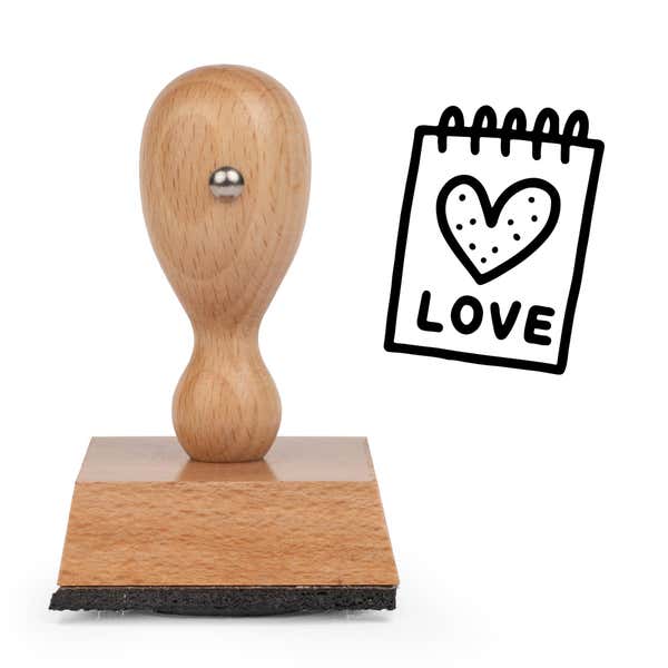 Sweet Love Notepad Craft Stamp standing upright beside its black stamped love notepad image