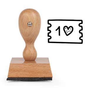 Date Night Love Ticket Craft Stamp standing upright beside its black stamped love ticket image