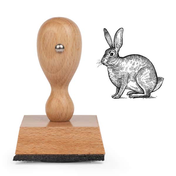 Woodland Rabbit Craft Stamp standing upright beside its black stamped engraved rabbit image