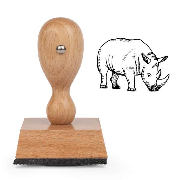 Safari Rhino Craft Stamp standing upright beside its black stamped sketched rhino image