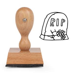 Graveyard RIP Tombstone Craft Stamp standing upright beside its black stamped RIP tombstone image