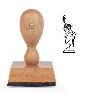 Statue of Liberty Craft Stamp standing upright beside its black stamped Statue of Liberty image
