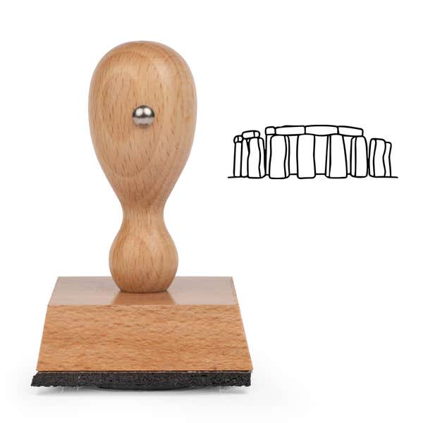 Stonehenge Craft Stamp standing upright beside its black stamped Stonehenge image