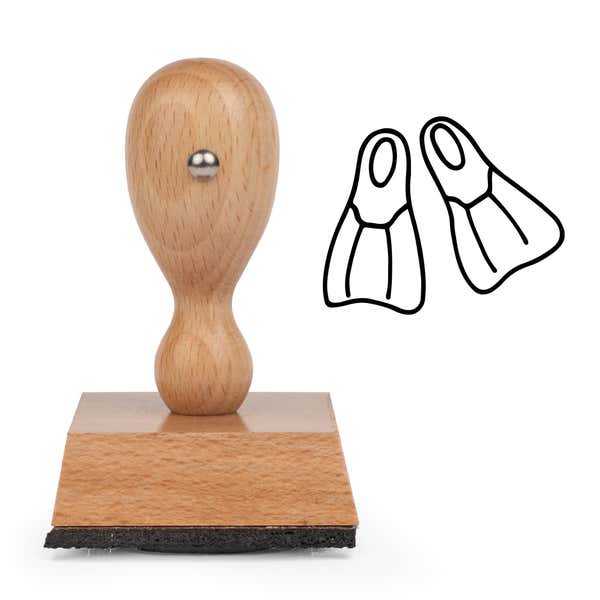 Swim Fins Craft Stamp standing upright beside its black stamped swim fins image