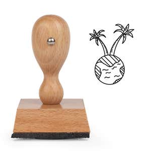 Tropical Globe Craft Stamp standing upright beside its black stamped tropical globe image