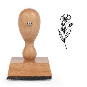 Five-Petal Wildflower Stem Craft Stamp standing upright beside its black stamped five-petal wildflower stem image