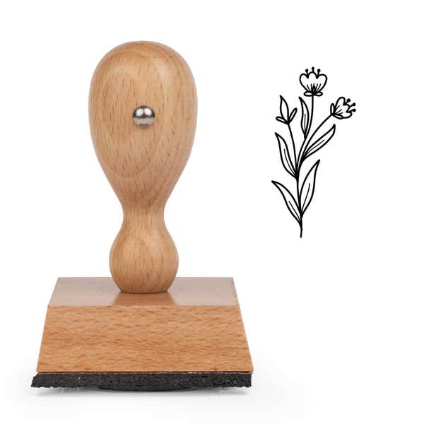 Dainty Bud Stems Craft Stamp standing upright beside its black stamped dainty bud stems image