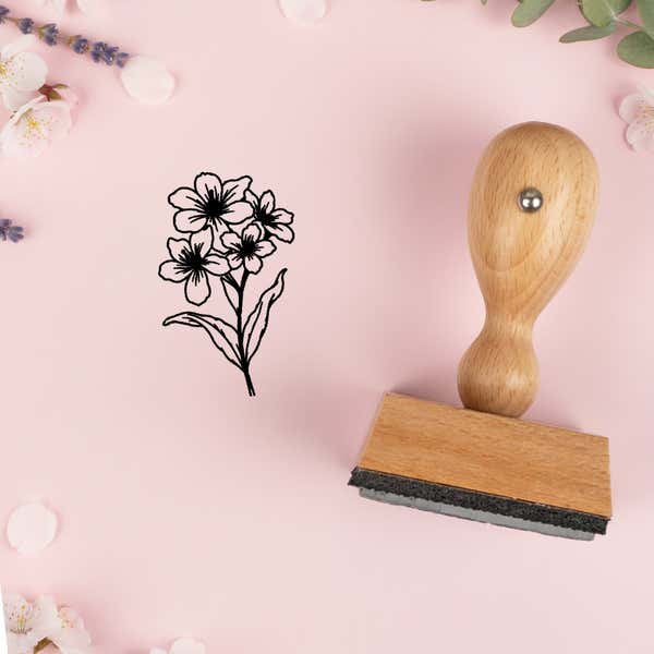 Clustered blossom spray stamped in black on pink cardstock with lavender sprigs and blossoms