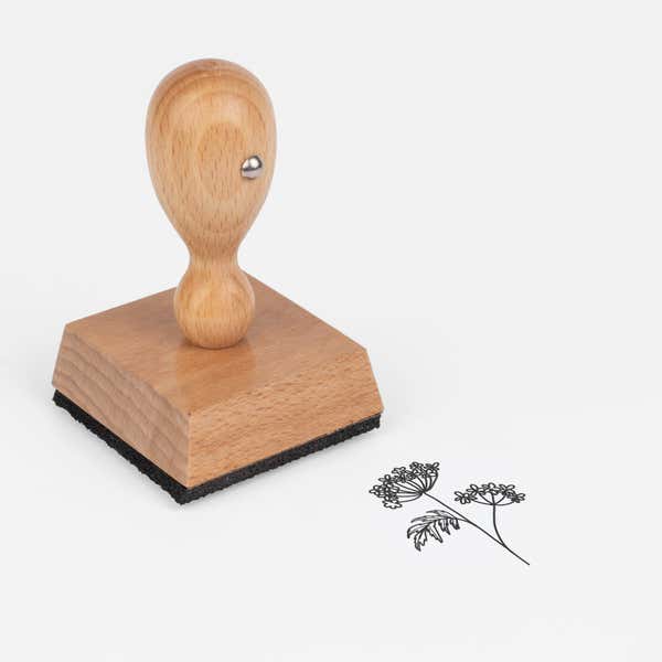 Lacy Umbel Wildflower Craft Stamp at an angle with its wooden handle and block